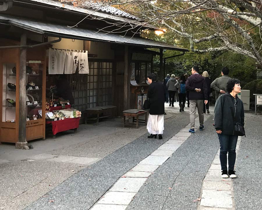 Kinkaku-ji, Golden Pavillion and Garden - stalls on either side of path leading to Gardens